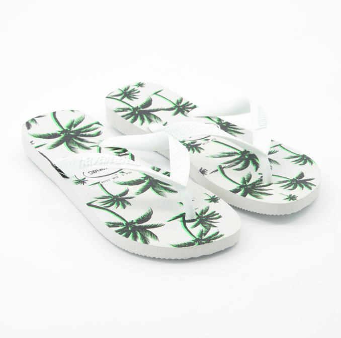 Havaianas  Chanclas blancas y negras con logotipo y patrón de palmera