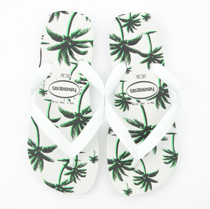 Havaianas  Chanclas blancas y negras con logotipo y patrón de palmera