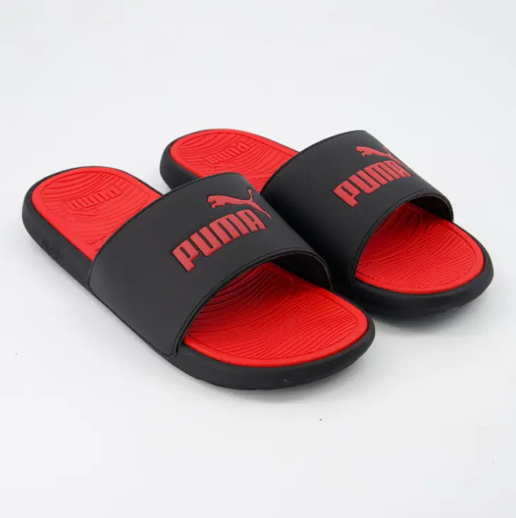 Chanclas de pala Puma hombre negras y rojas, diseño deportivo con logo Puma en relieve sobre banda negra, en Ashé Mi.