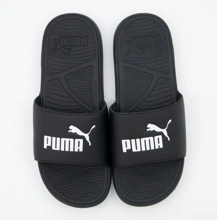 Chanclas unisex Puma negras con suela resistente