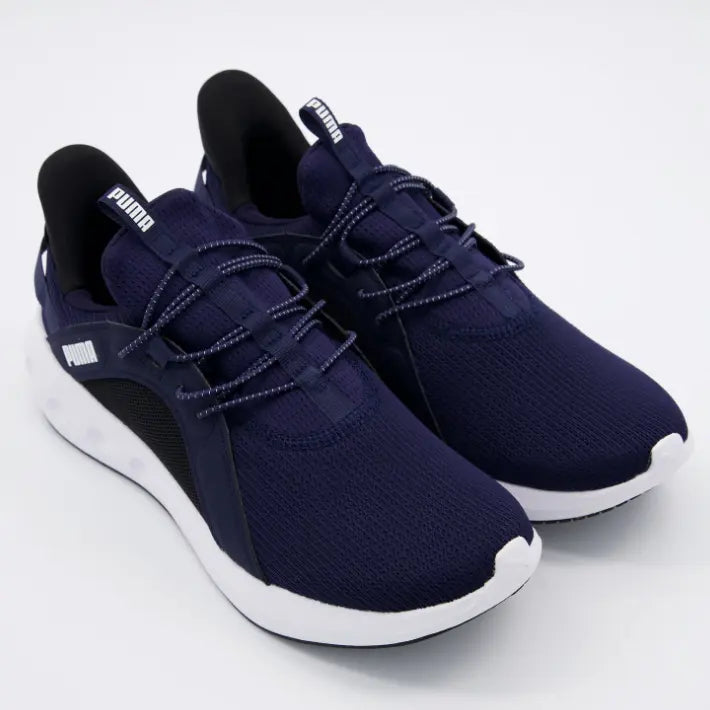Zapatillas Puma Softride Carson Sliptech azul oscuro con suela blanca