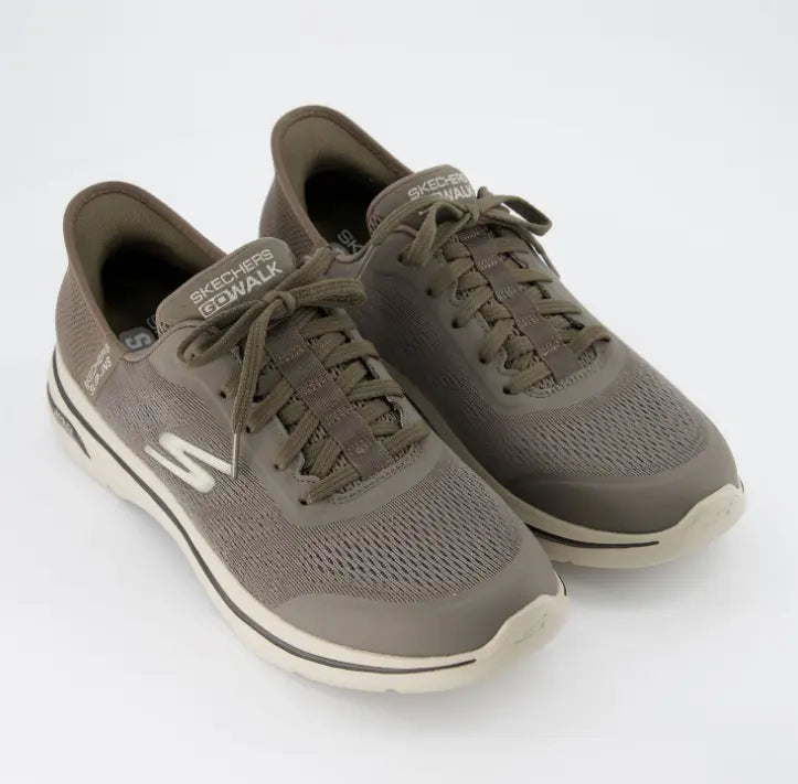 Zapatillas Skechers Hands Free Slip-ins GO RUN Consistent 2.0, cordones elásticos y suela blanca deportiva.